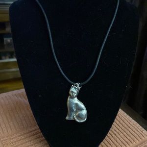 Cat pendant on black rope necklace
